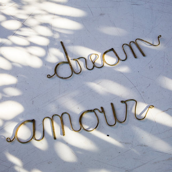 Dream Brass sign